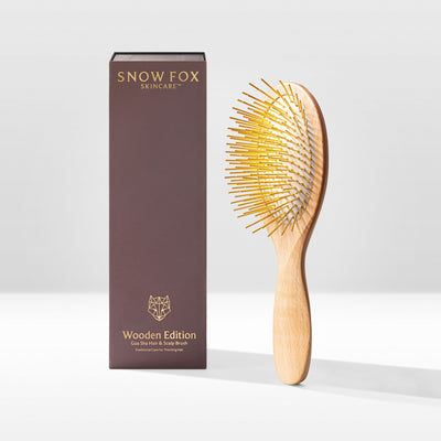 Stimulate acupressure points and promote healthy hair growth with our hand-carved 24K gold-plated, premium wooden Gua Sha Hair &; Scalp Brush.